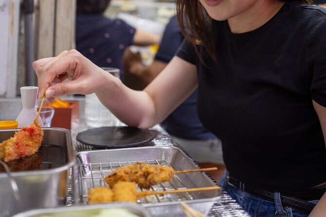 Shibuya by night in Small Groups: Neon Lights and Local Flavors - Stop 6: Antenna 21 Onigiri Stand for a Classic Bite