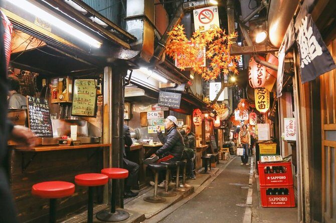 Shinjuku Golden Gai Food Tour - Golden Gai finale at Araku Bar: tiny pubs, tight lanes, and an easy landing