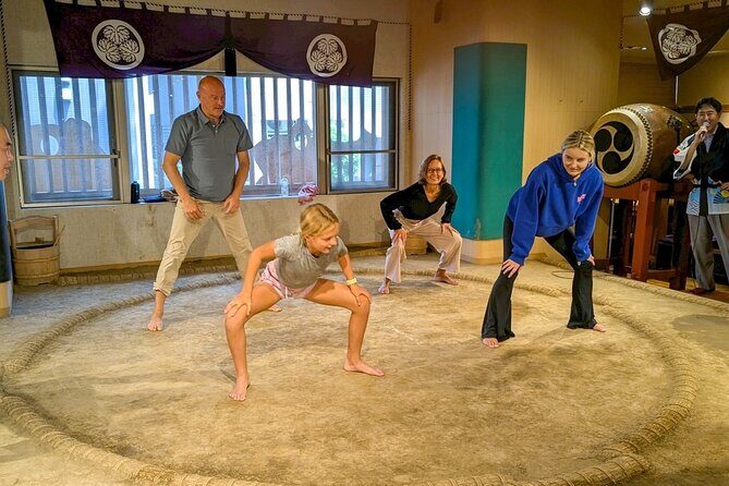 The SUMO Show & Experience with Hot pot lunch - The clay dohyo challenge (and the padded-suit push)