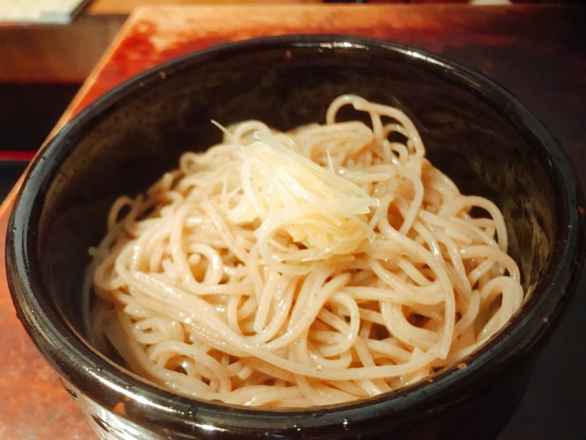 Tokyo: 2-Hour Asakusa Food Hunt & Cultural Tour - The soba and gyoza meal: a family restaurant pace