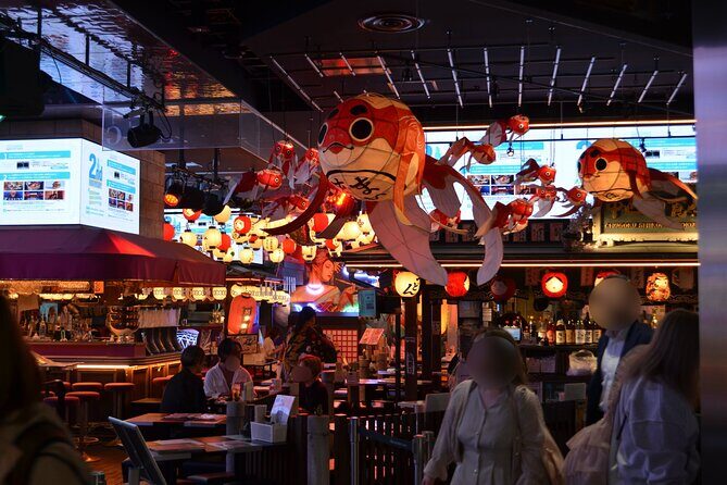 Tokyo After Dark Shinjuku Tour of Tradition and Pop Culture - Getting oriented fast: Shinjuku Station to Hanazono Shrine