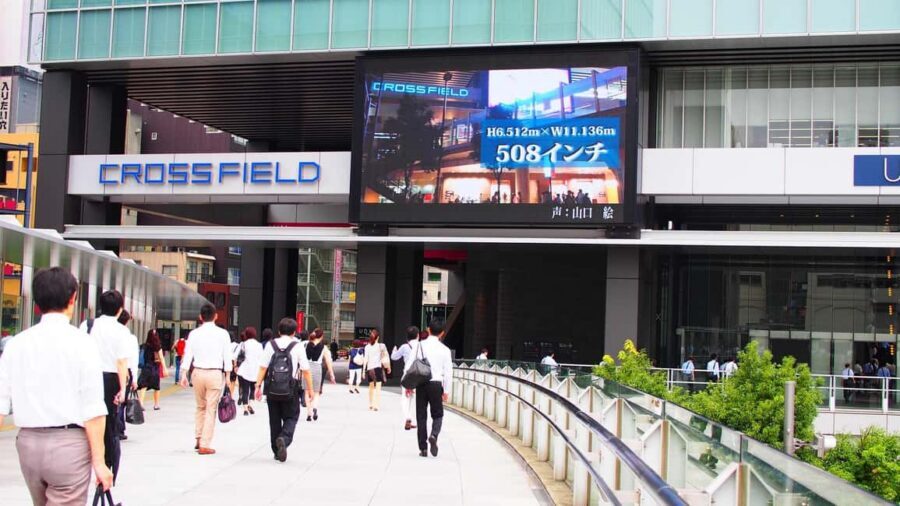 Tokyo Akihabara Anime walking tour & Maid Cafe option - Electric Town Neon Signs and the UDX Building Photo Moment