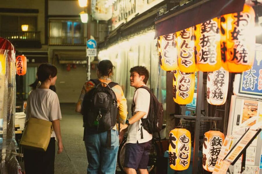 Tokyo: Asakusa Photogenic Night Walk with 1 drink - Hanayashiki Amusement Park stop: a quick dose of nostalgia