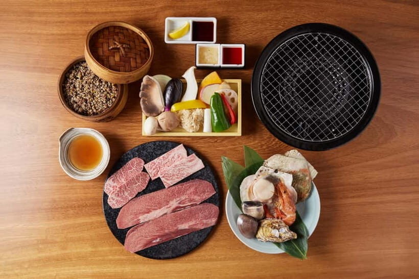 Tokyo: Japanese Experiece Dinner with Diving Ama Performance - Location Near Shimbashi: Finding AMAJOH in the Basement
