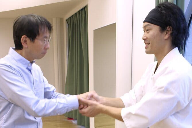 Tokyo: Karate Experience with Former All-Japan Champion - The lesson flow: bowing, belly breathing, and stretching first