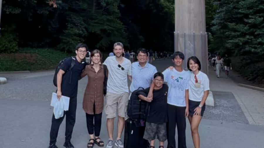 Tokyo: Meiji Shrine Walking Tour with Local Guide - Meeting your guide with the blue A4 board (and why it matters)