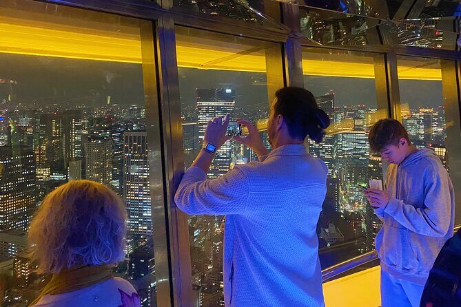 Tokyo Night E-Bike Tour with Tokyo Tower and Dolphin Show - The guides: friendly, English-speaking, and good at making stops click