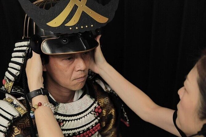 Tokyo Samurai Armor Experience in a Photo Studio - The dressing process: staff help you go from civilian to warrior