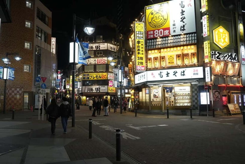 Tokyo: Shibuya Food Tour, Neon Lights & Local Flavors - Don Quijote Discount Chaos: Quirky Finds and Snack Browsing