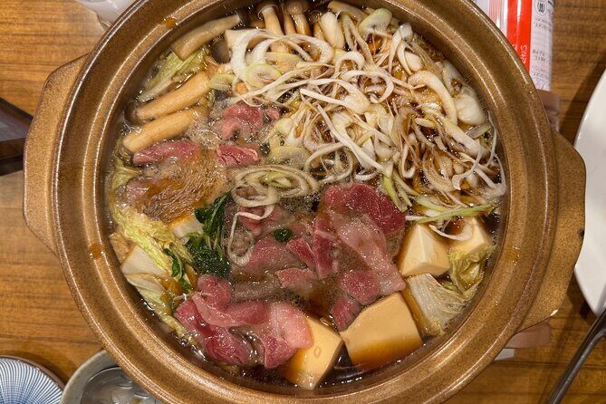 Tokyo Shinjuku Bar Hopping –Wagyu , Ramen & 7 Dishes - The games: the secret sauce for meeting people fast