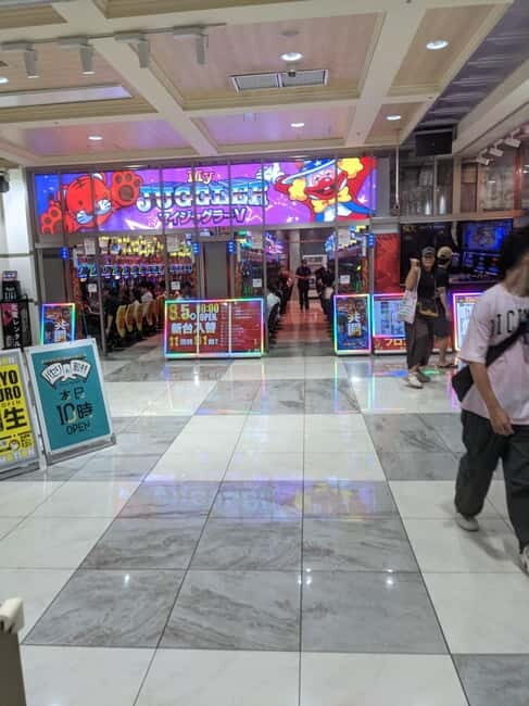 Tokyo Shinjuku : Private Walking Night Tour with Pachinko - Why Shinjuku at night feels like a different city