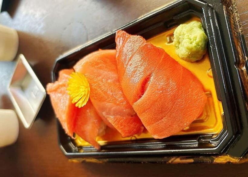 Tokyo: Tsukiji Market and Hama-rikyu Gardens Guided Tour - Tsukiji Hongwanji Temple: A Quiet Reset Before the Snacks