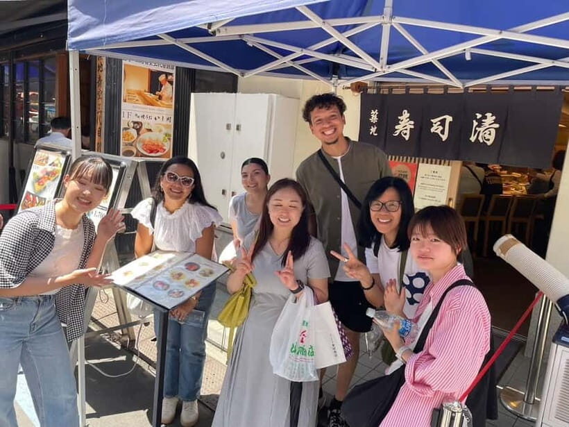 Tokyo: Tsukiji walk & sushi private tour with Uni Students - Namiyoke Inari Jinja: the short shrine stop that adds context