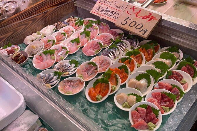 Tokyo:Enjoy street food & Japanese food culture at Tsukiji Market - Tsukiji Honganji Temple: a calm first stop before the snacks