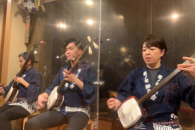 Tsugaru shamisen performance over traditional dinner - Senso-ji Temple: old roots, clear context