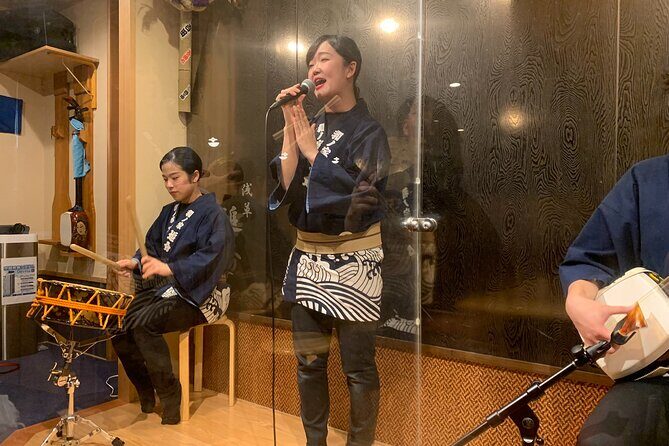 Tsugaru shamisen performance over traditional dinner - Nakamise Street: a short stroll that can still feed your night