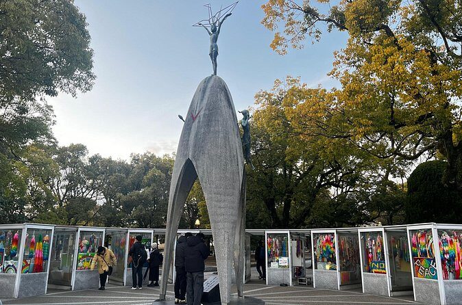 Walking Through History: Hiroshima's Path to Peace - Peace Flame and the Peace Memorial Hall: hope you can stand near